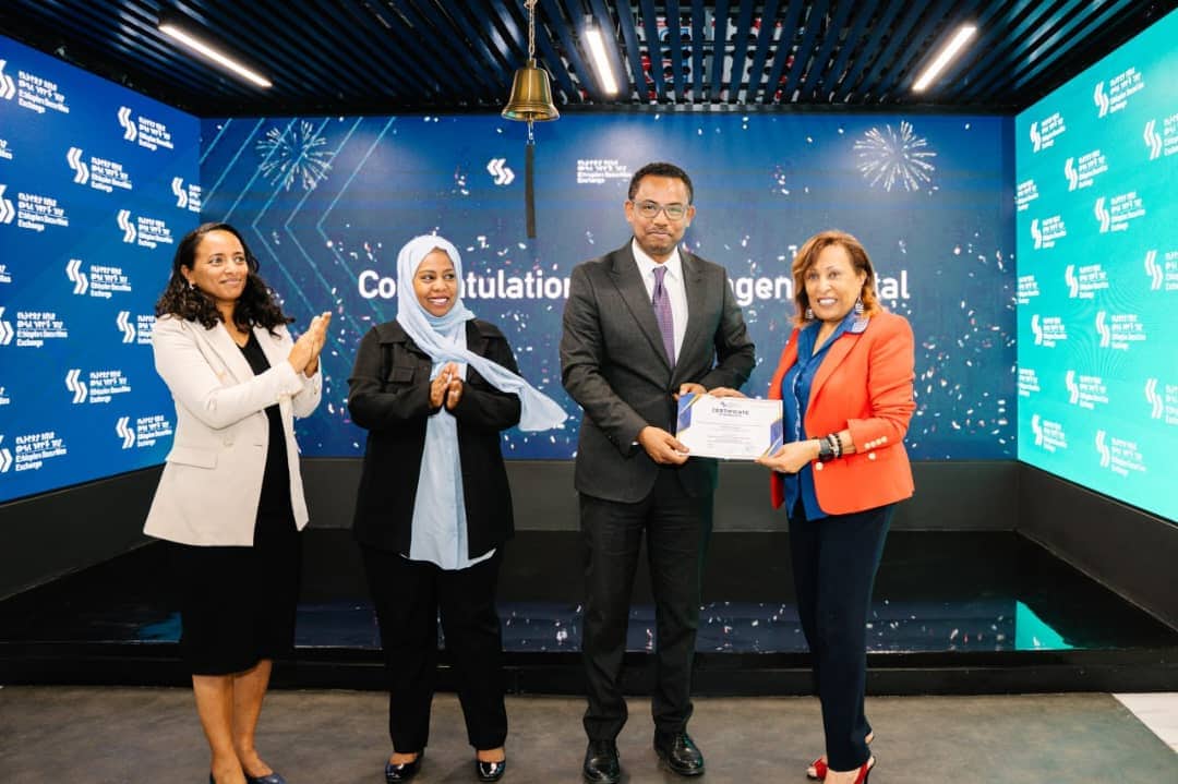 four people on a stage as Ethiopian Securities Exchange admits first trading member