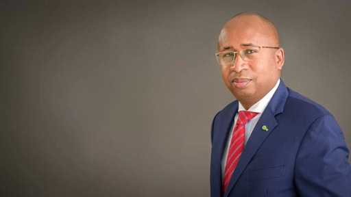 Individual business leader in suit Haruna Jalo-Waziri, Managing Director and Chief Executive Officer of CSCS Nigeria T+2 settlelement, technology