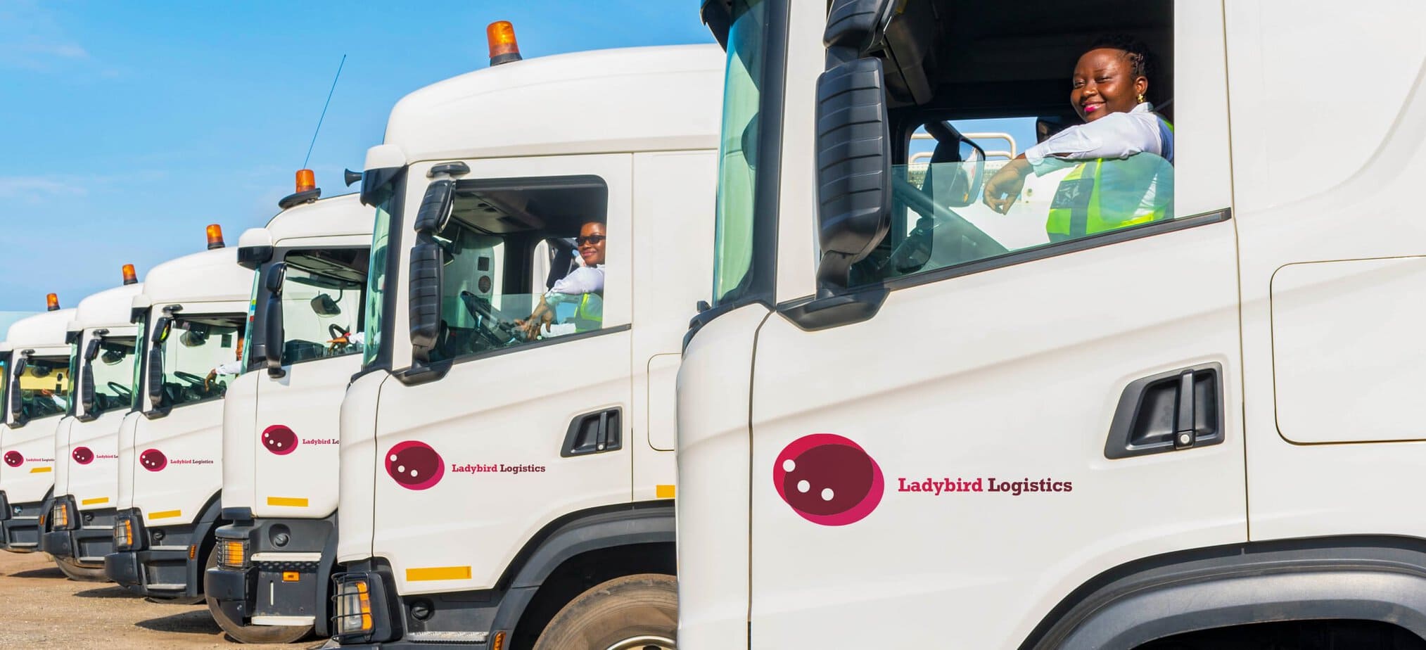 Women truck drivers at the all-women Ladybird Logistics to illustrate the successful share offer capital raise by ZEN Petroleum on the Ghana Stock Exchange