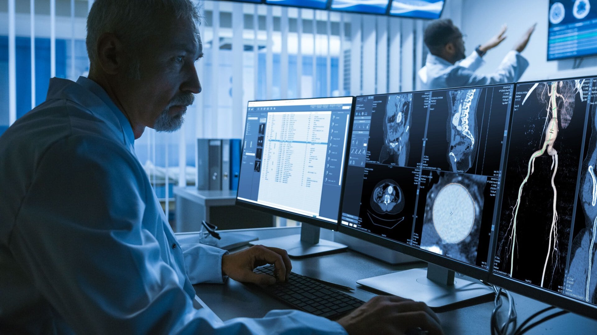 A man in white labcoat in front of medical imaging monitor. Medtech firm T2S is busy with a share offer on the Bourse de Casablanca.